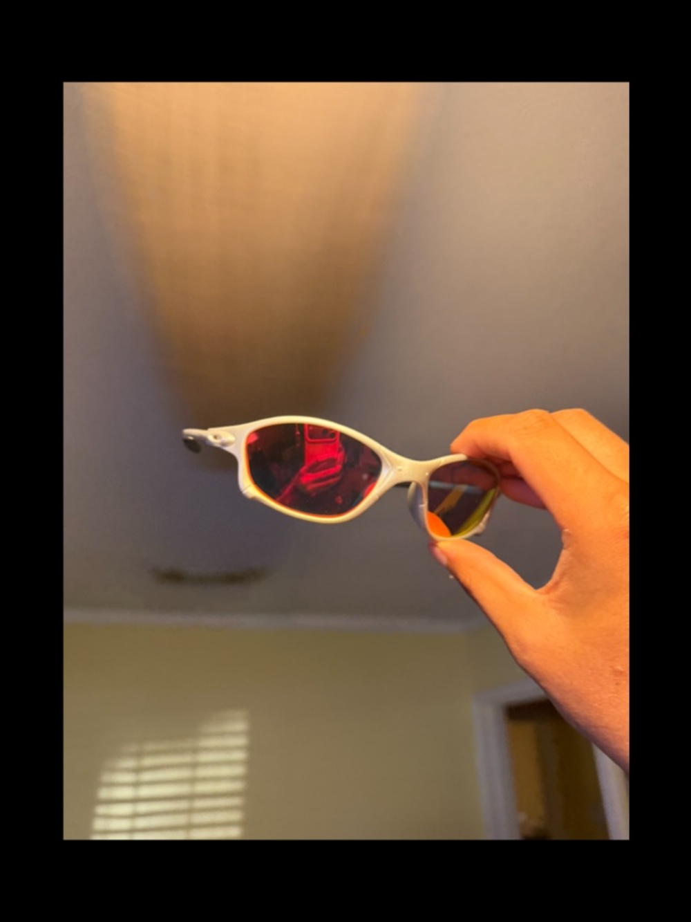 Sporty White Frame Sunglasses with Red Reflective Lenses Oakley